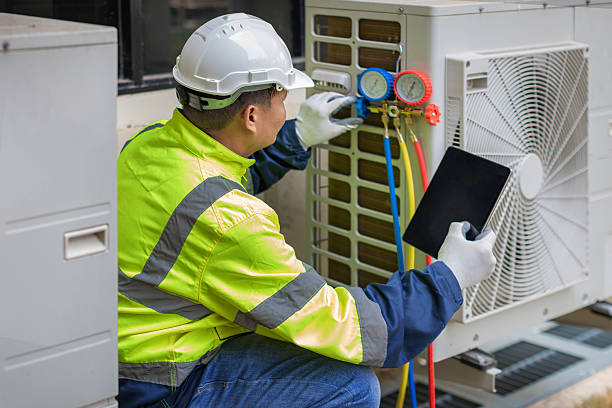 Professional Air Duct Cleaning technician working in Holualoa, HI